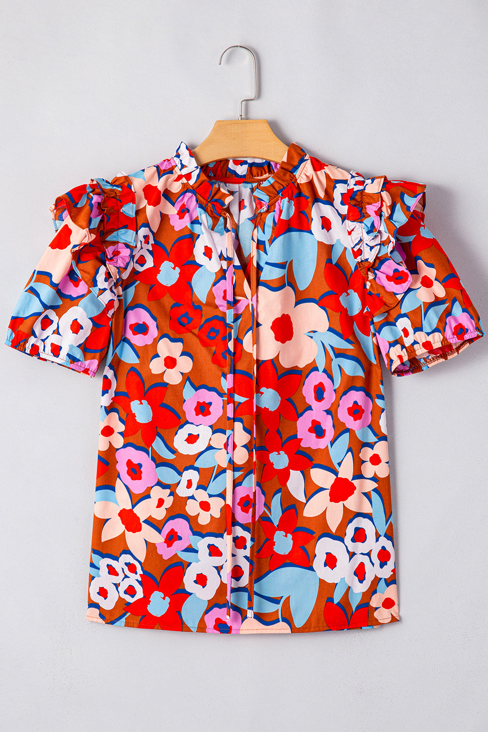 Chemisier à imprimé floral, col à volants et manches bouffantes