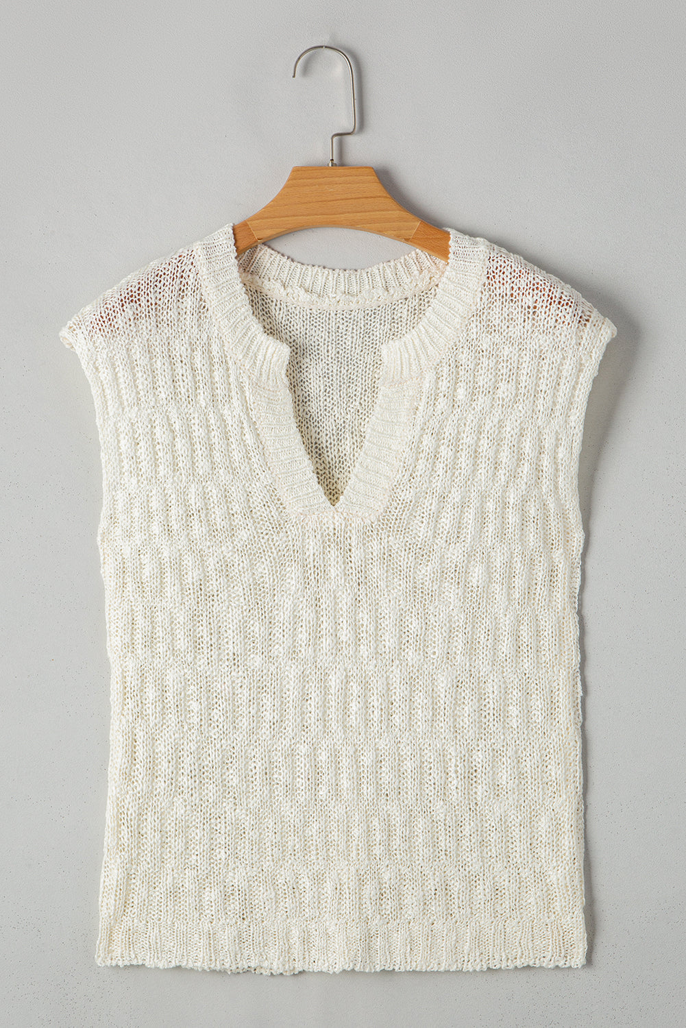 Pull à manches courtes et col en V cranté