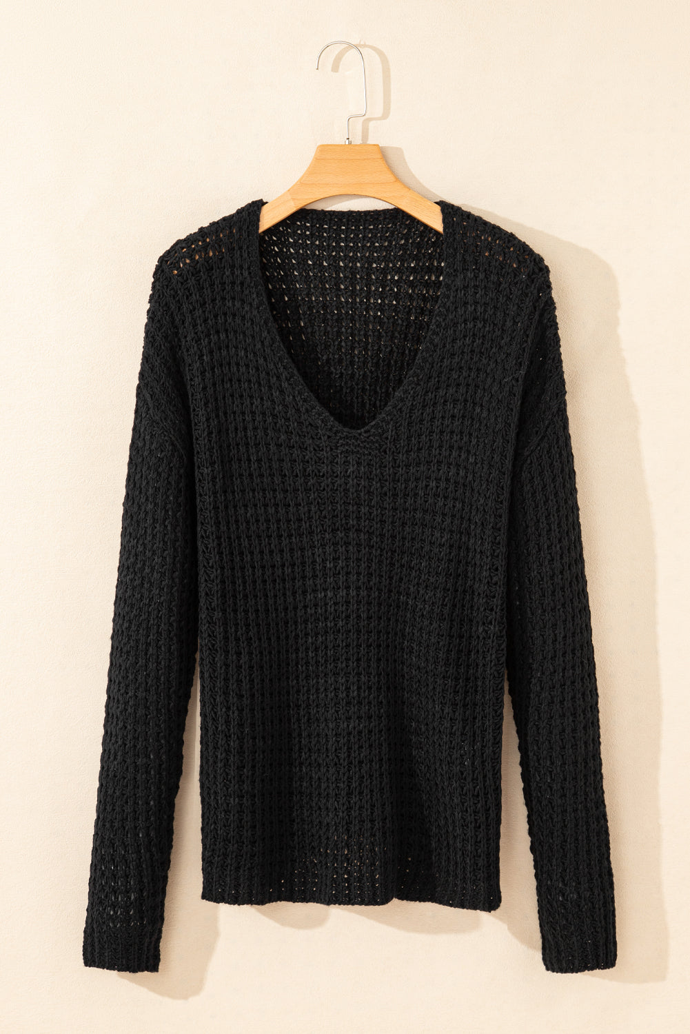 Pull à col en V au crochet évidé