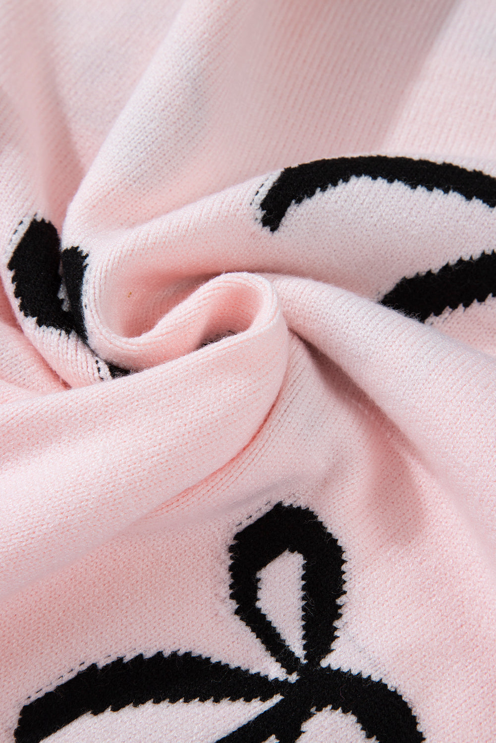 Pull ample en tricot à motif nœud
