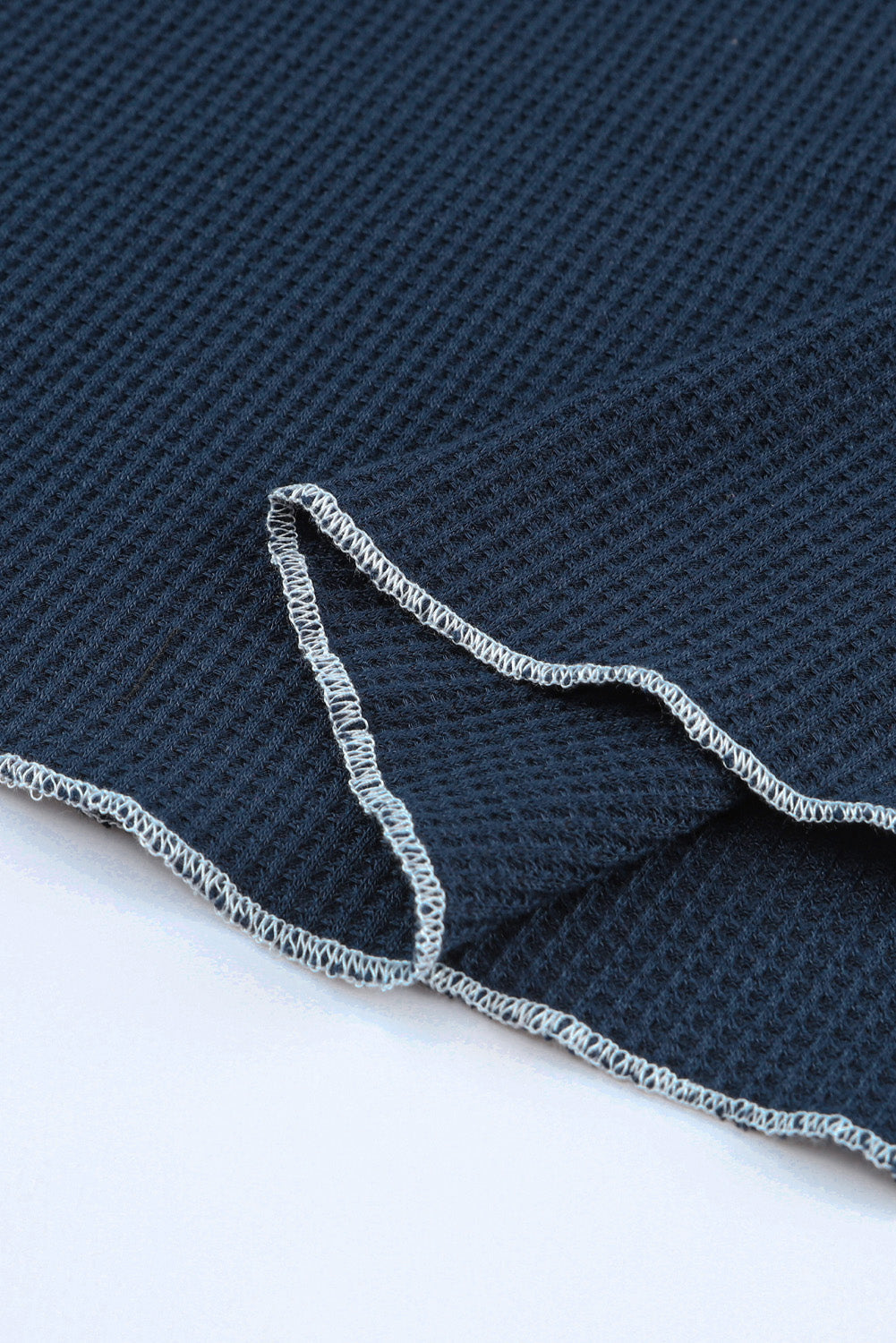 Haut texturé à manches longues et col rond