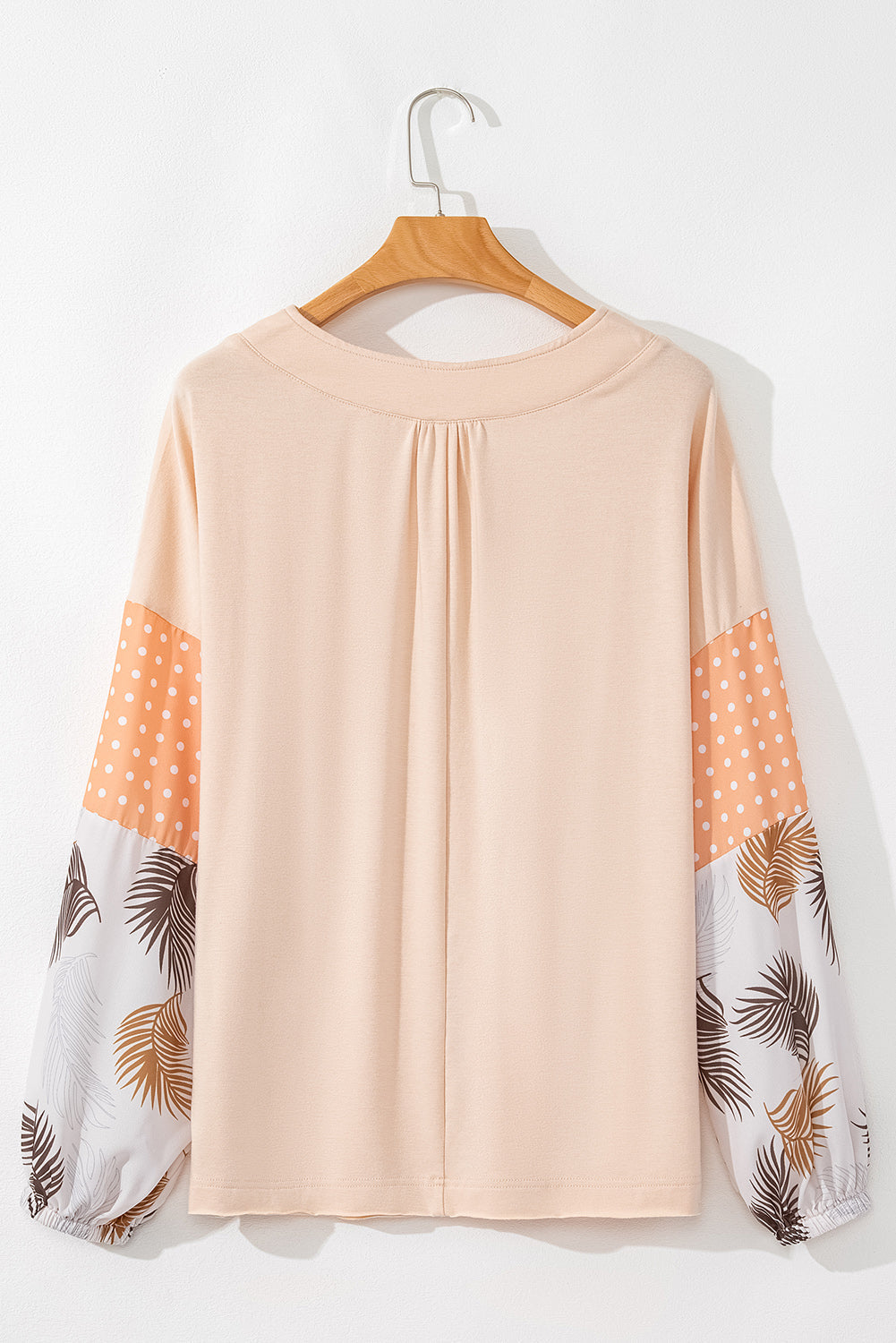 Blouse ample a col en V et manches bouffantes a pois et feuilles de palmier