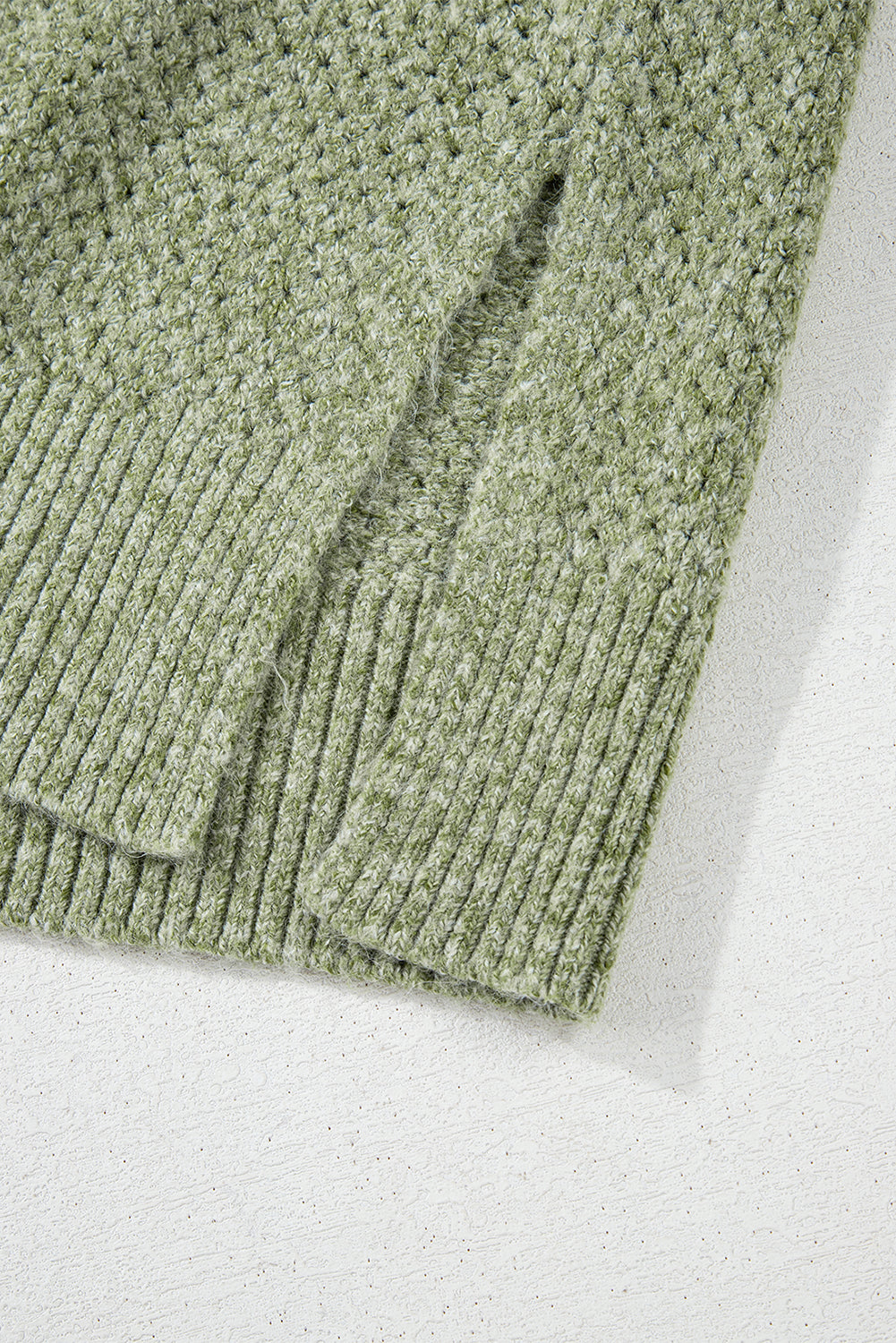 Pull ample a œillets et col en V, épaules tombantes