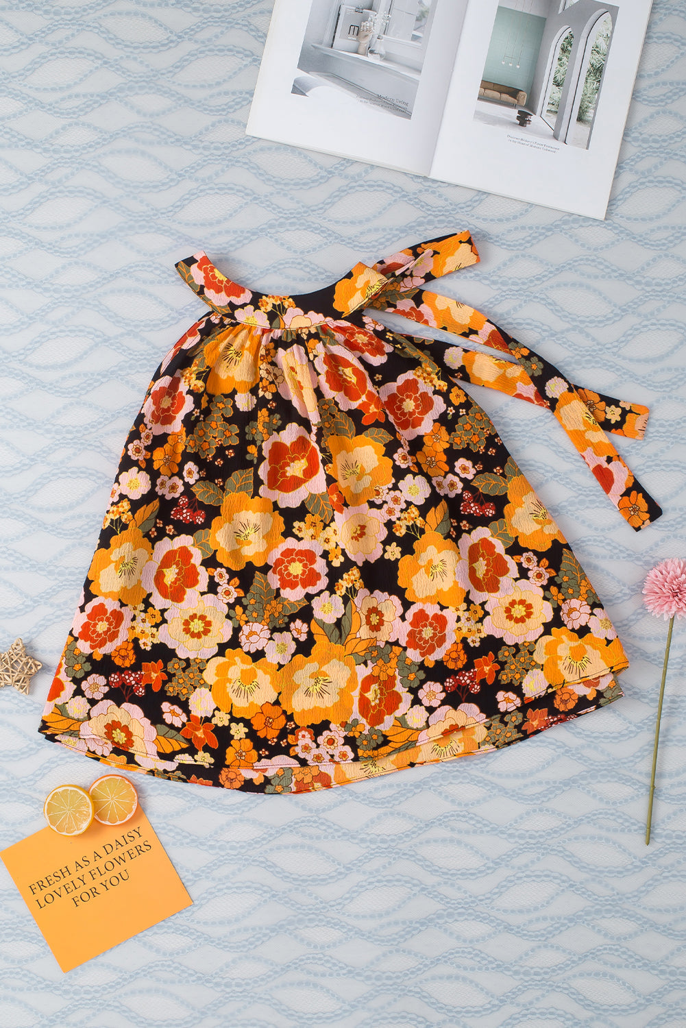 Haut sans manches noué à imprimé floral et col licou