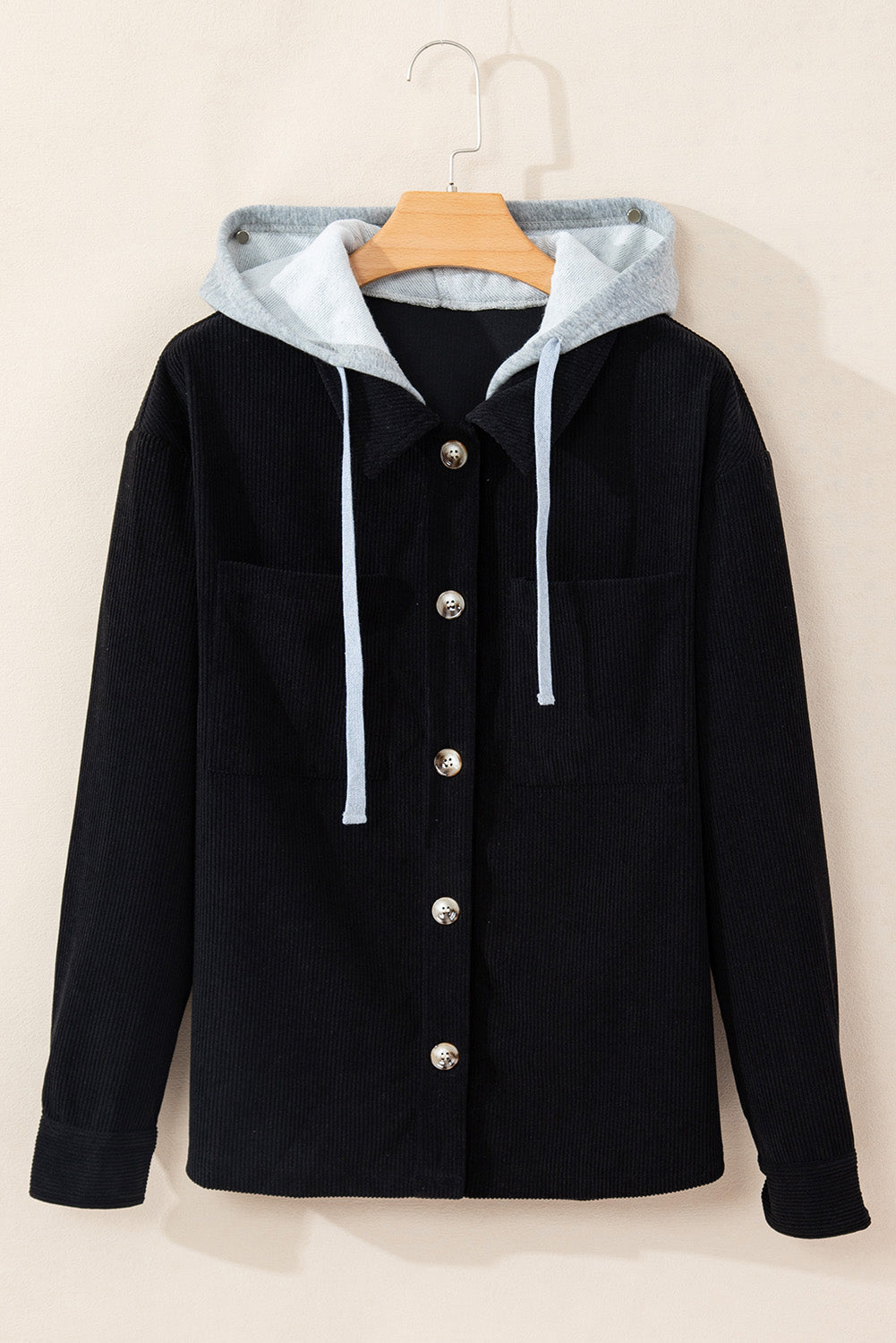 Veste en velours côtelé noire a capuche et poches avec cordon de serrage