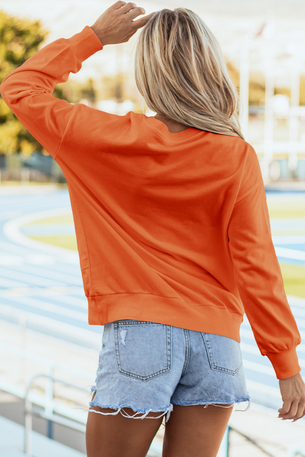 Tinsel Game Day - Sweat-shirt graphique a épaules tombantes