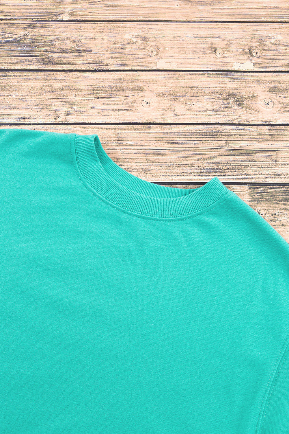 Sweat-shirt uni a col rond et épaules tombantes