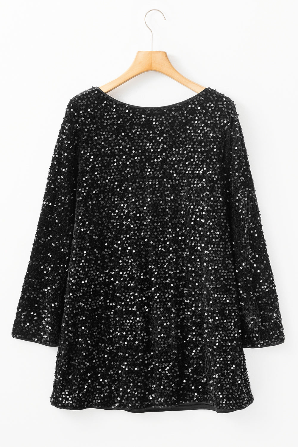 Mini-robe a paillettes et manches longues avec nœud découpé dans le dos
