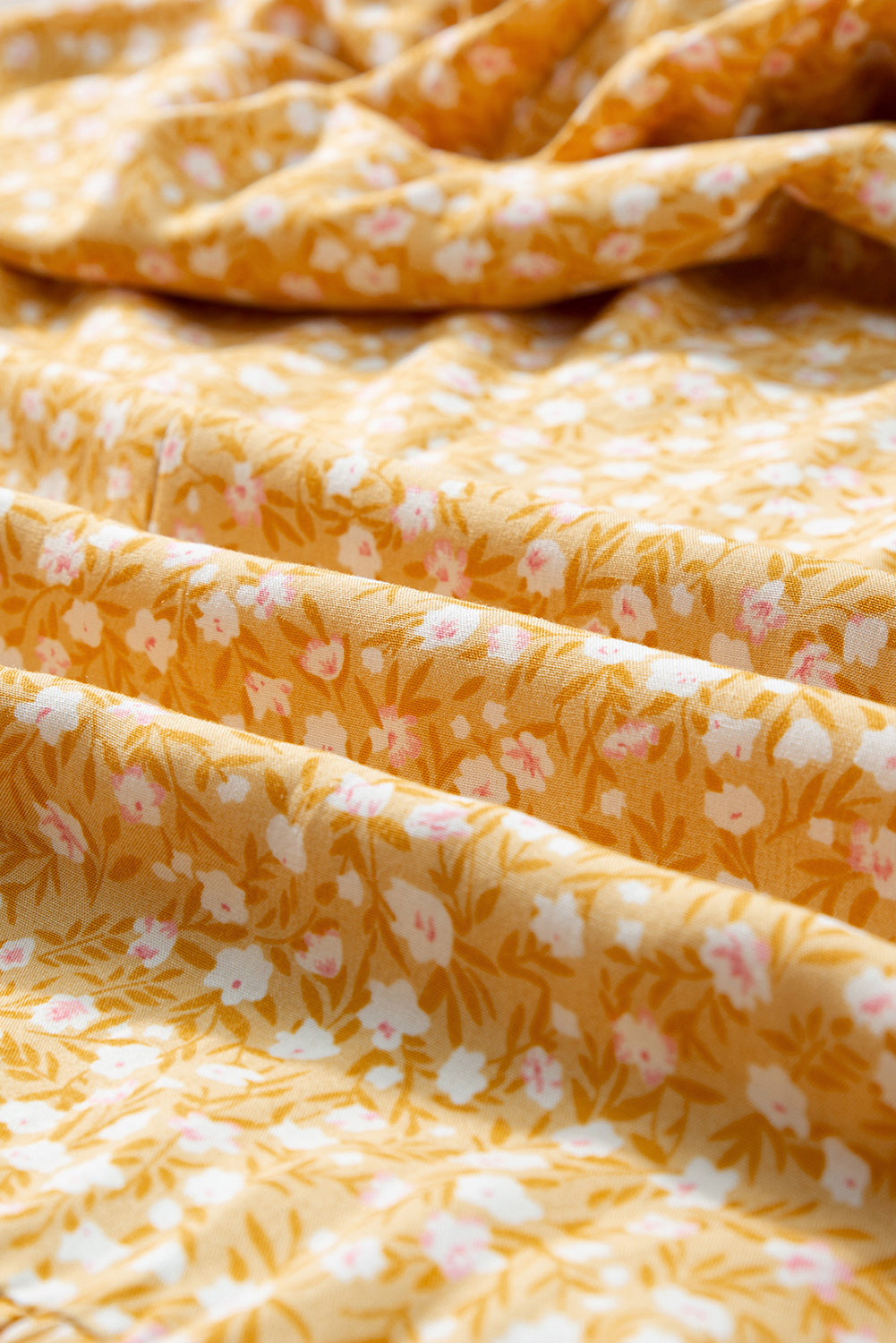 Robe longue florale smockée taille haute à froufrous