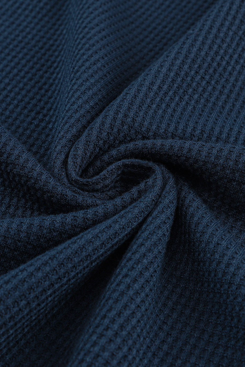 Haut texturé à manches longues et col rond