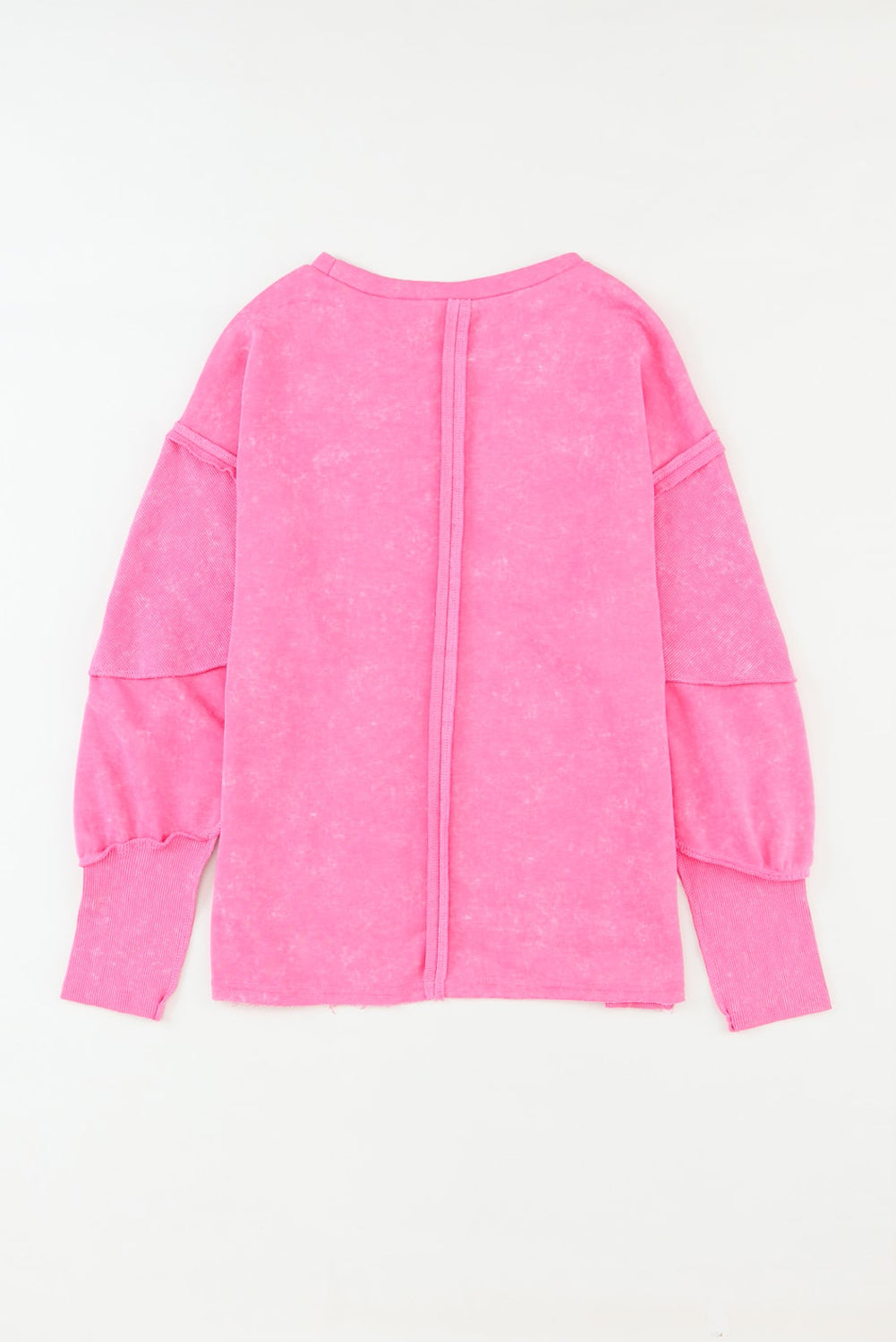Sweat-shirt à bords bruts, coutures apparentes, haut et bas