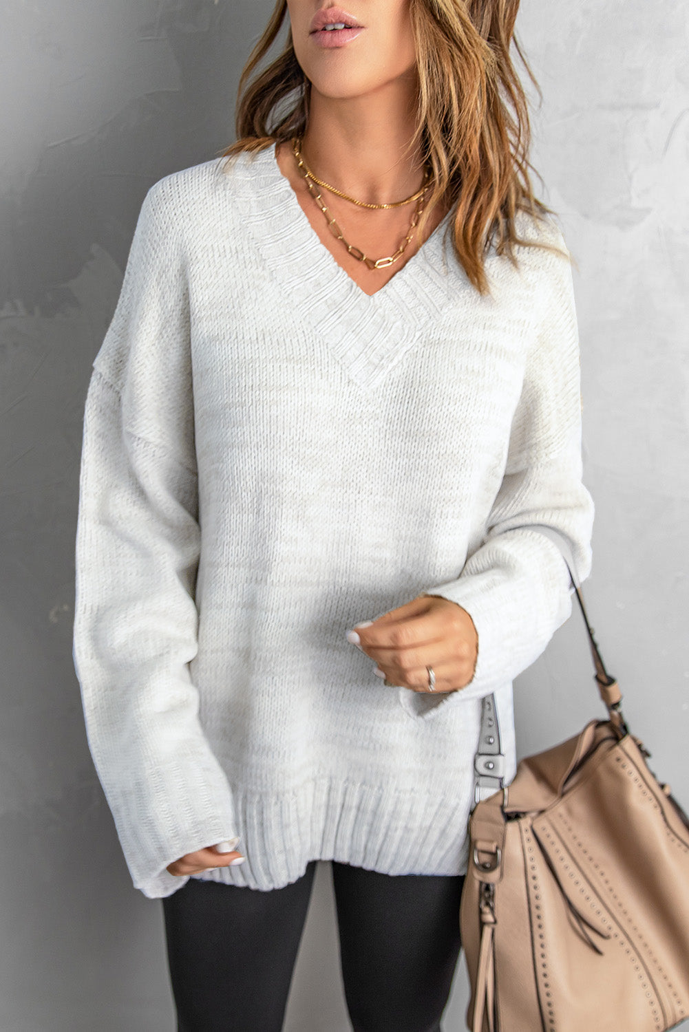 Pull tricoté à épaules tombantes et col en V