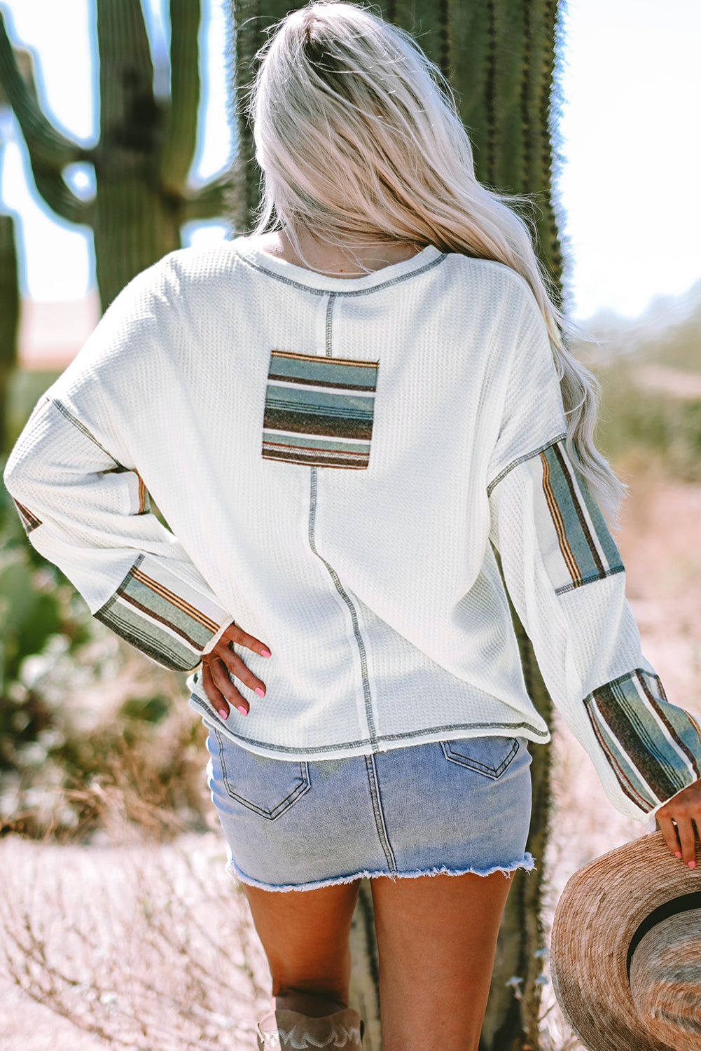 Haut en tricot gaufré a coutures apparentes et patchwork rayé