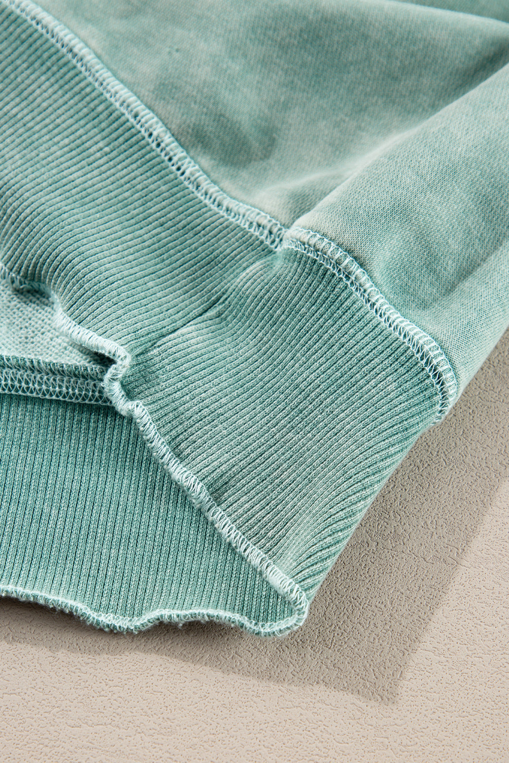 Sweat-shirt a manches raglan en tricot gaufré uni