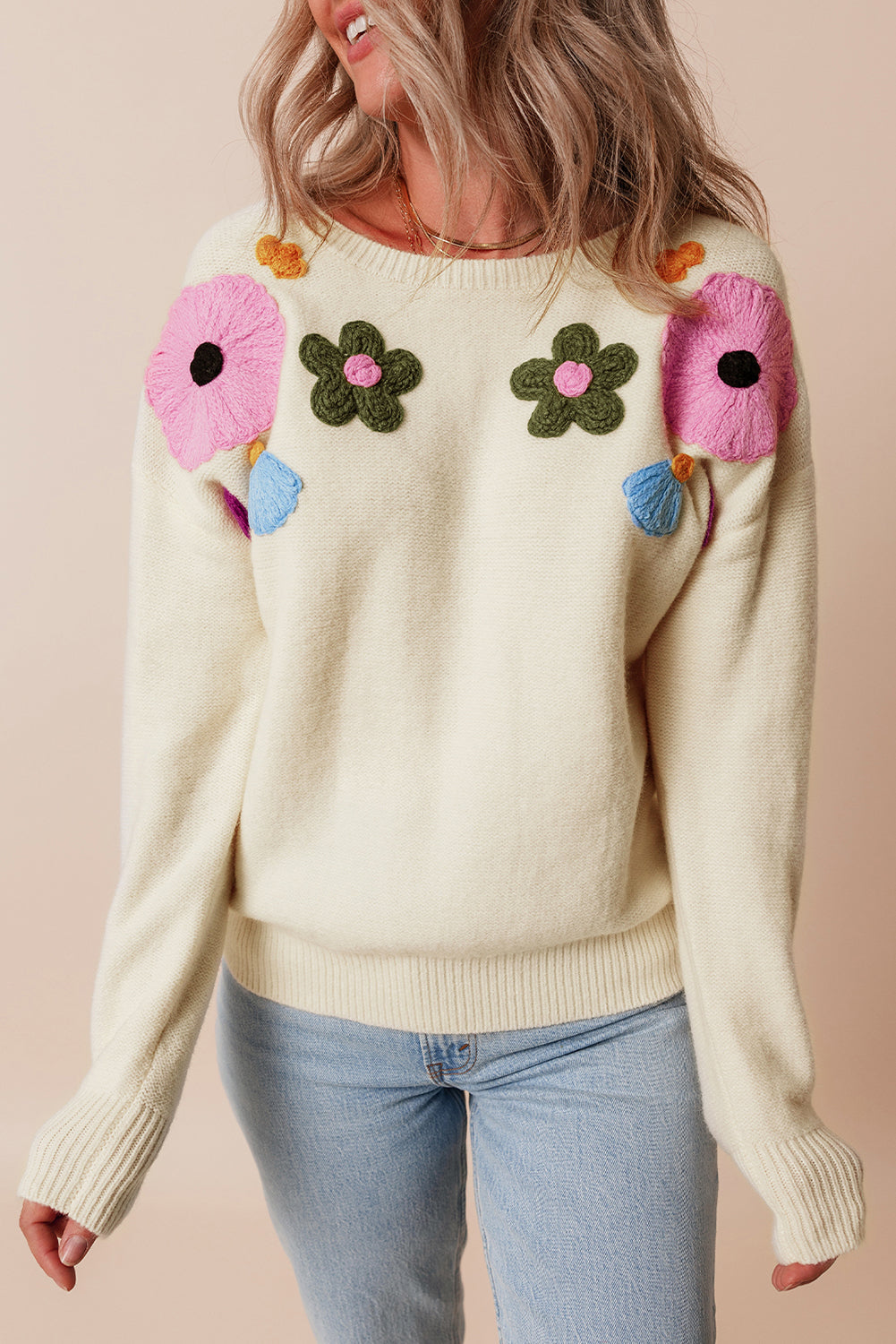 Pull tricoté à bords côtelés à motif floral