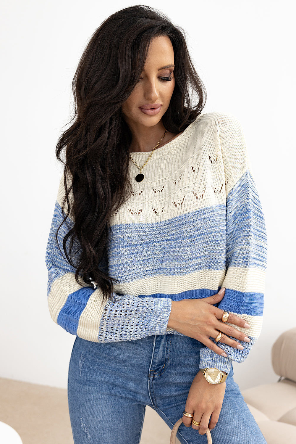 Pull a manches bouffantes et point ouvert
