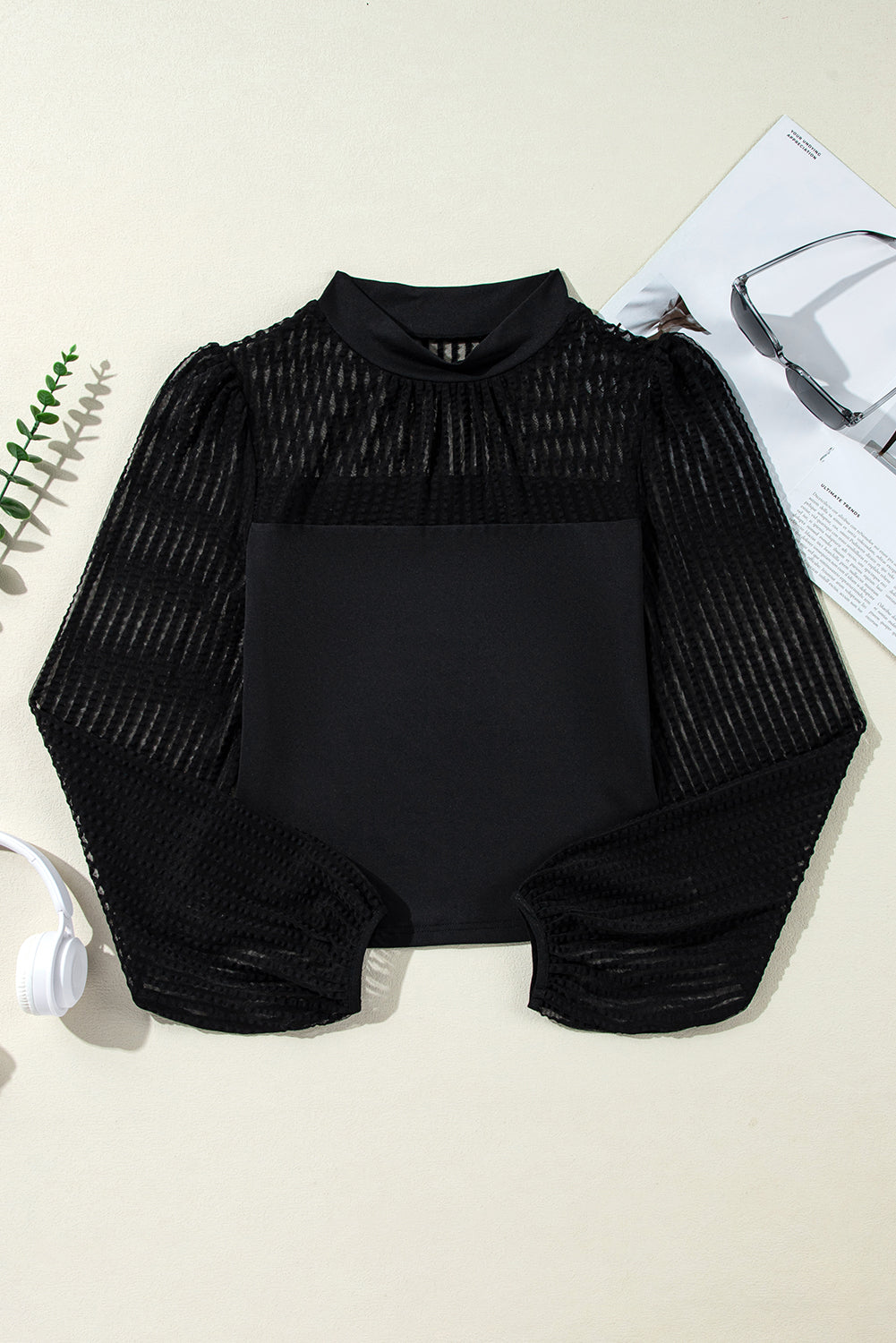 Blouse à manches lanternes en maille rayée à col montant