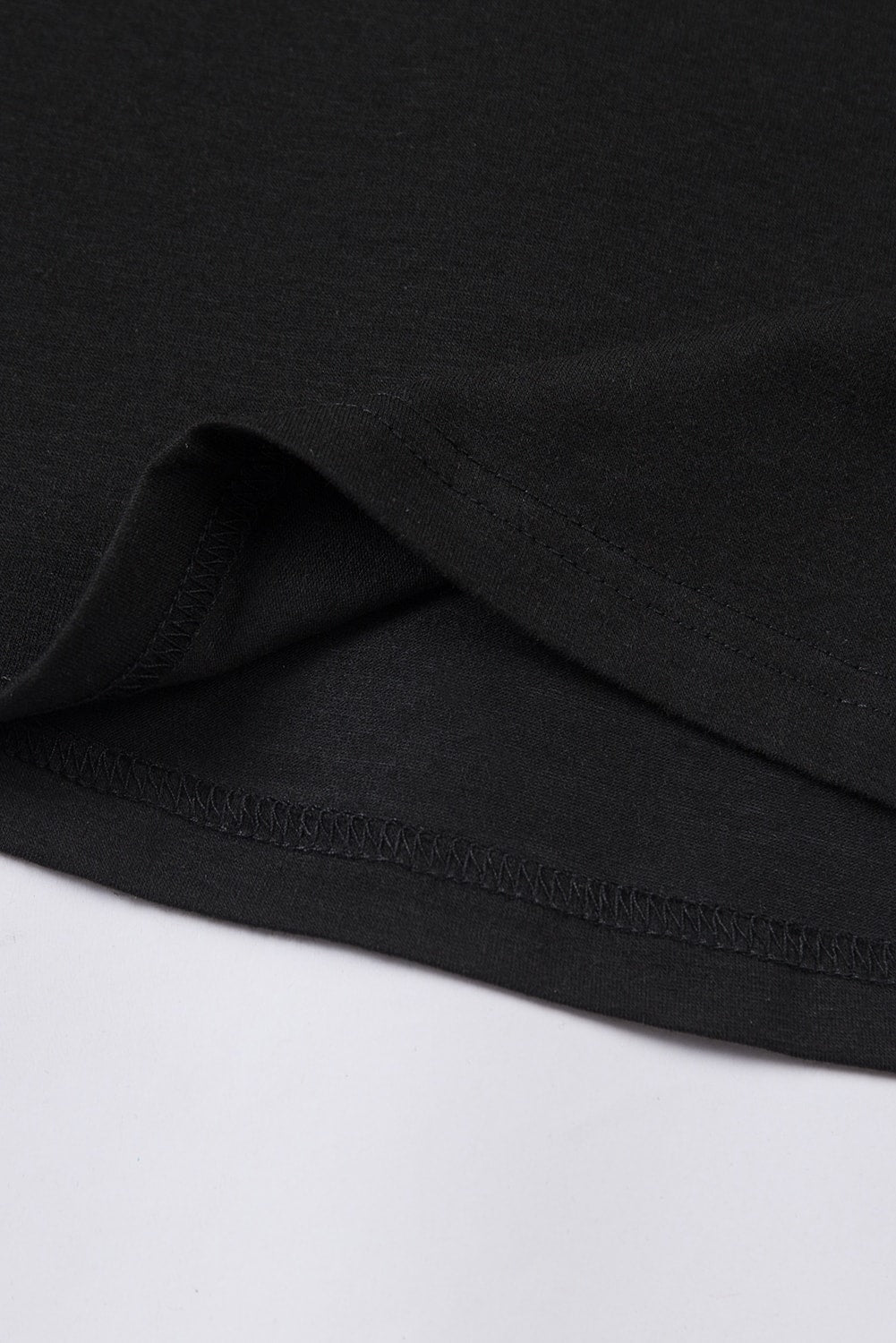 T-shirt noir à col rond de couleur unie
