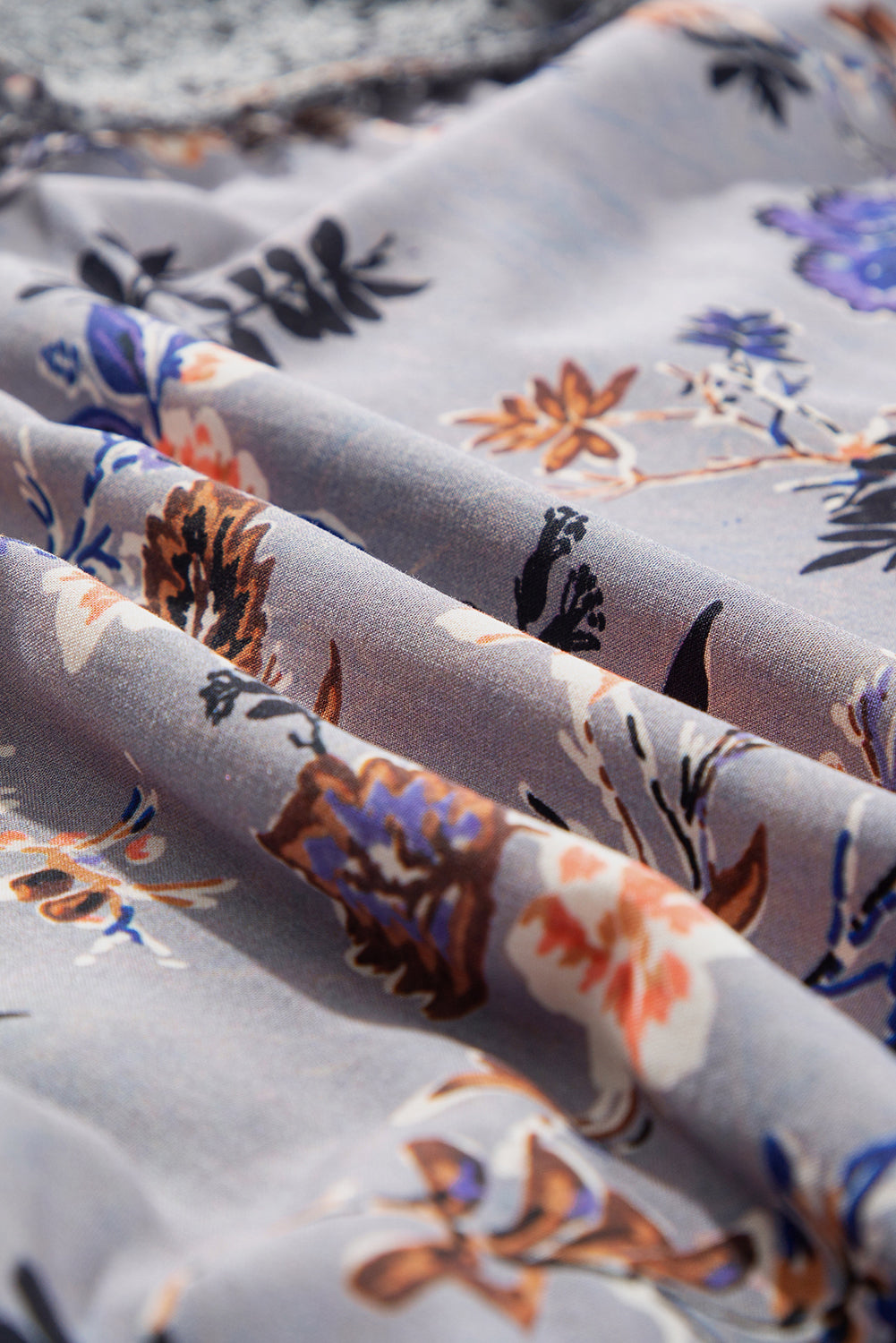 Chemisier à col en V et imprimé floral en dentelle patchwork avec nœud sur le devant