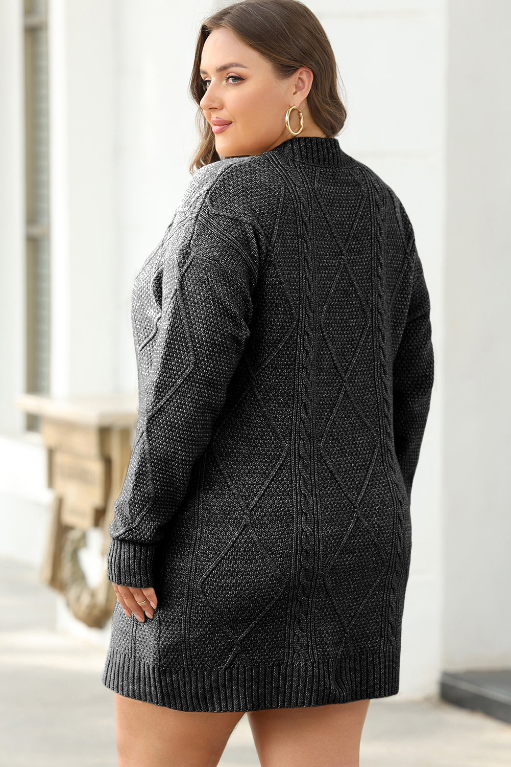 Robe pull coupe ample en tricot torsadé a épaules tombantes