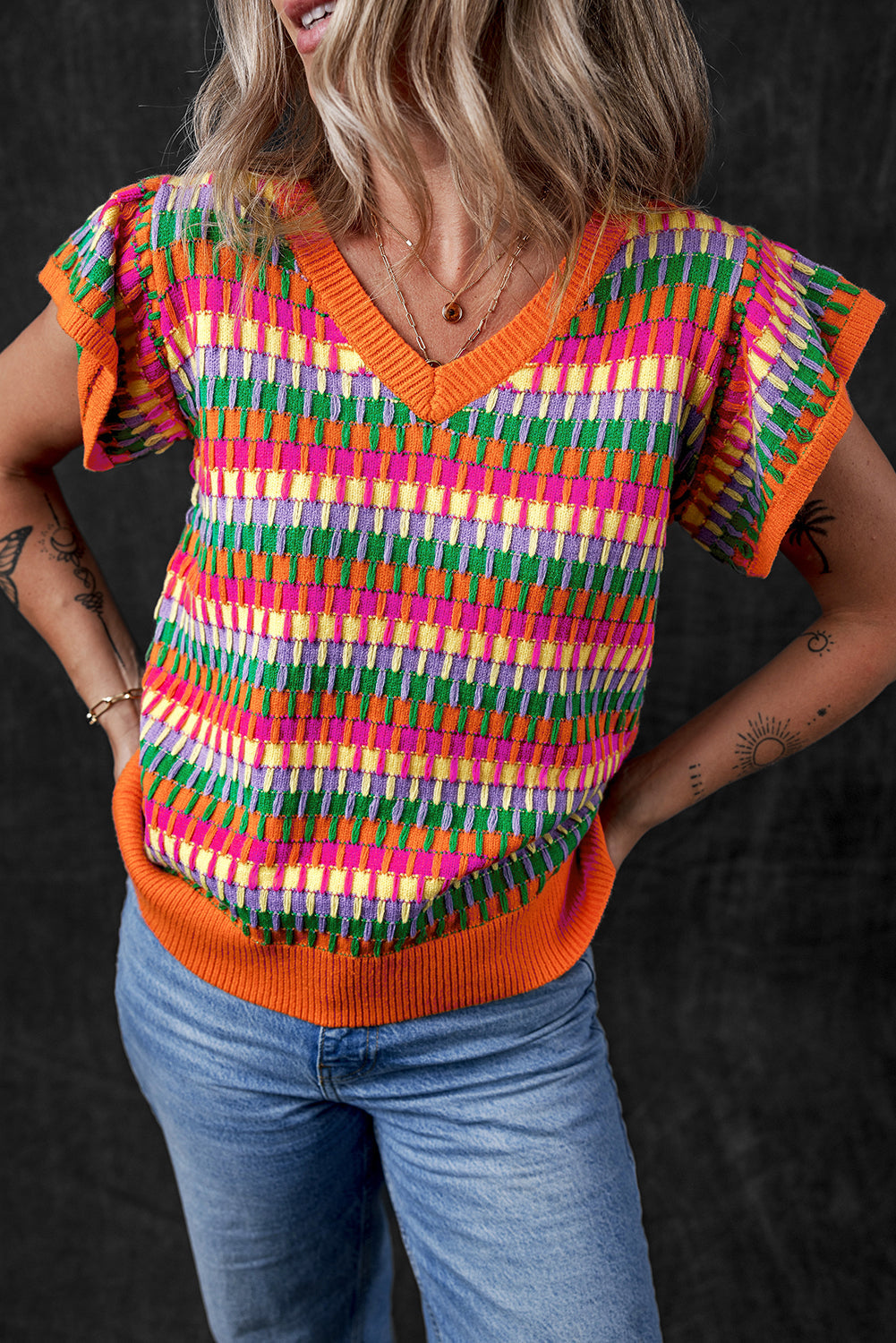 Haut pull tricoté a manches flottantes multiples