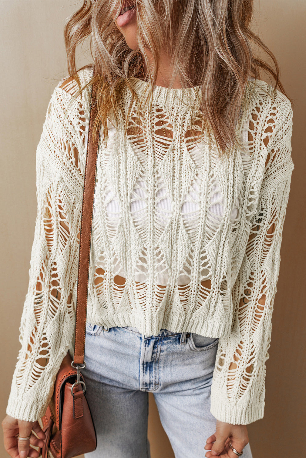 Pull coupe ample à col ras du cou et découpes en crochet