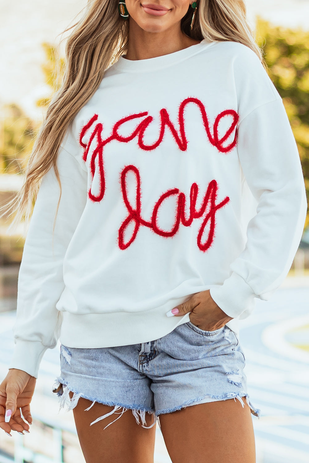 Tinsel Game Day - Sweat-shirt graphique à épaules tombantes