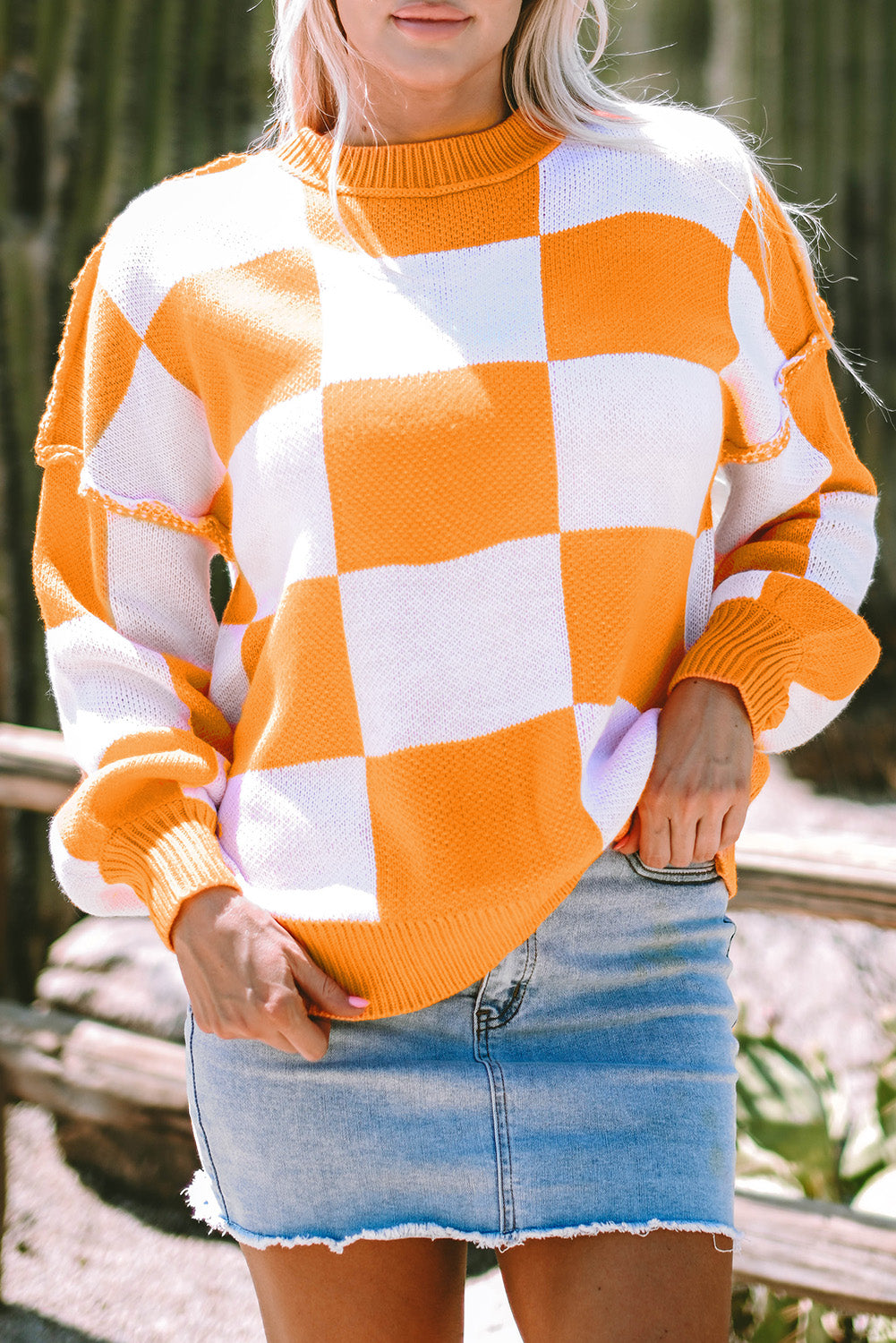 Pull orange a manches évêque a carreaux
