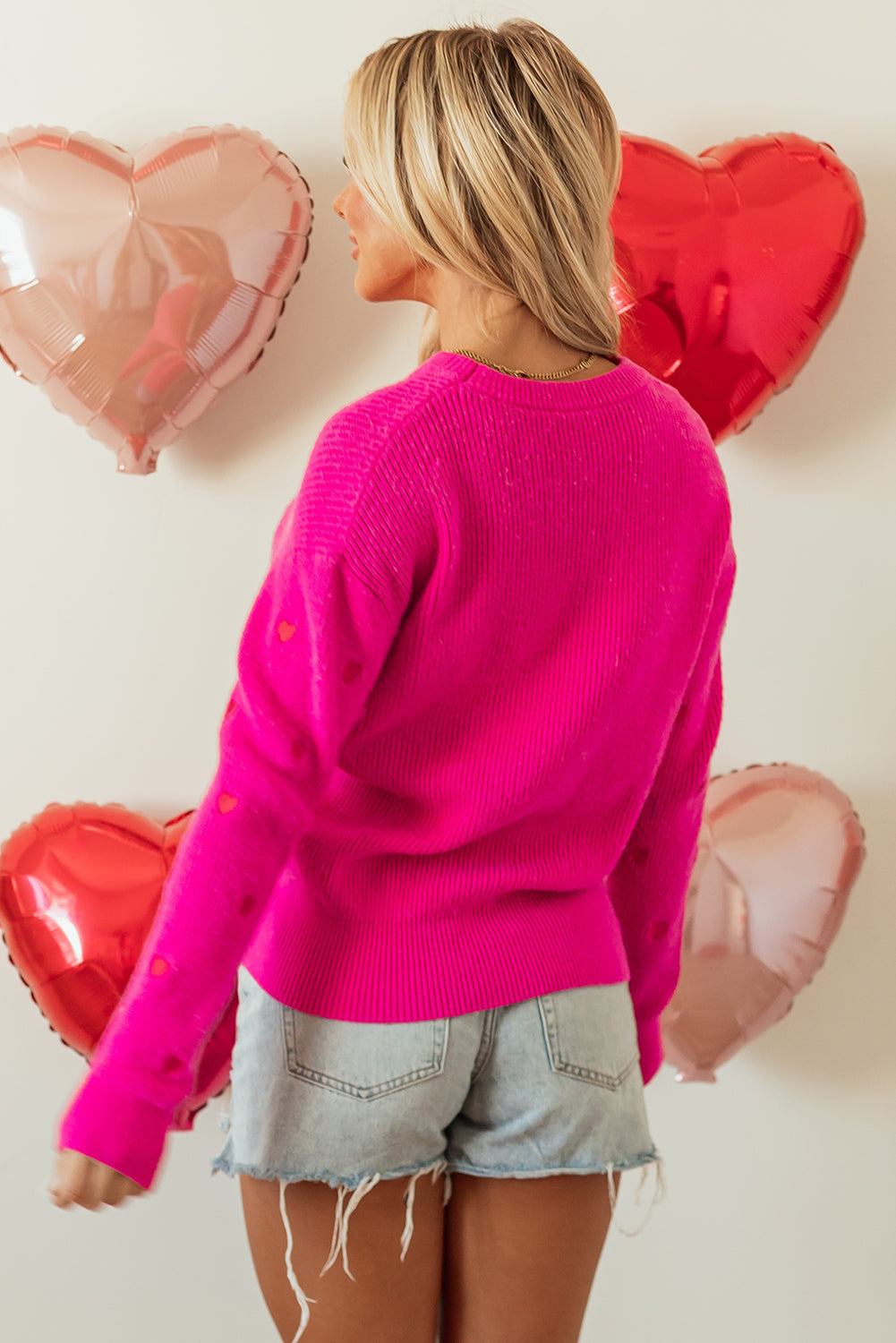 Pull a col rond et épaules tombantes en forme de cœur