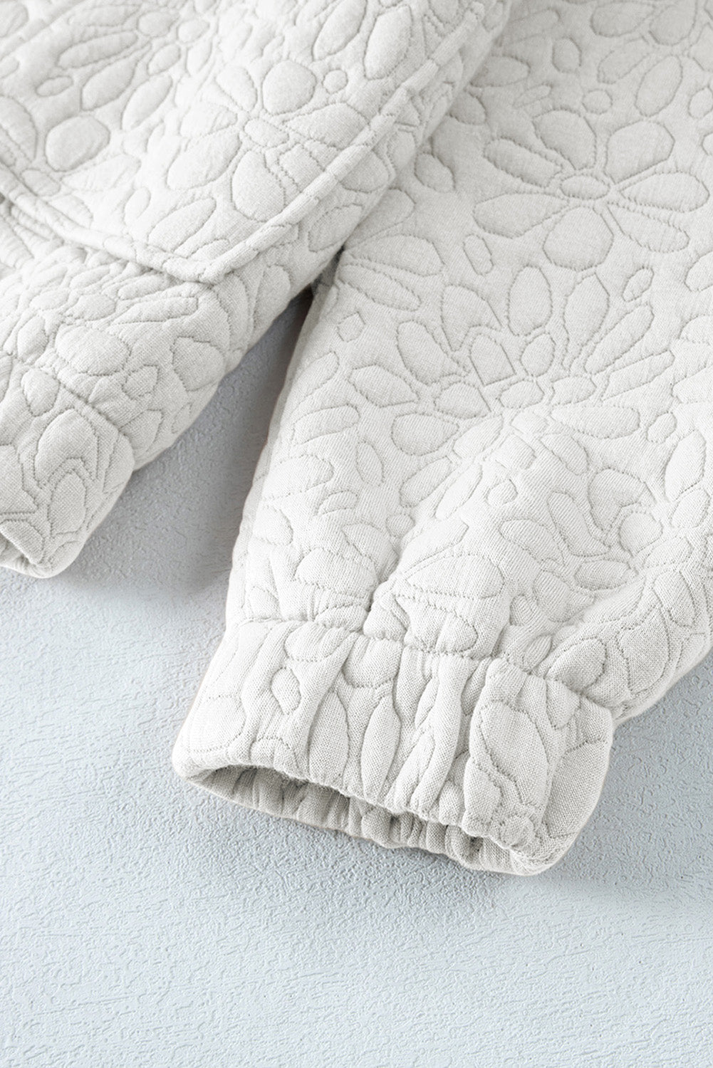 Veste matelassée a fleurs