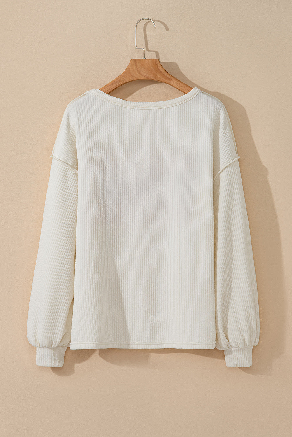 Haut a manches tombantes en tricot patchwork a coutures apparentes