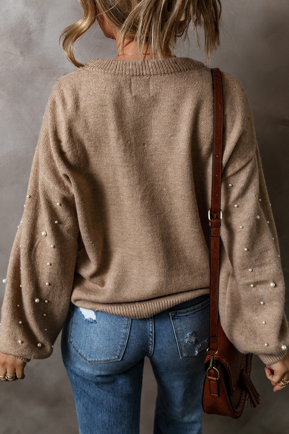 Pull à col rond et épaules tombantes perlées