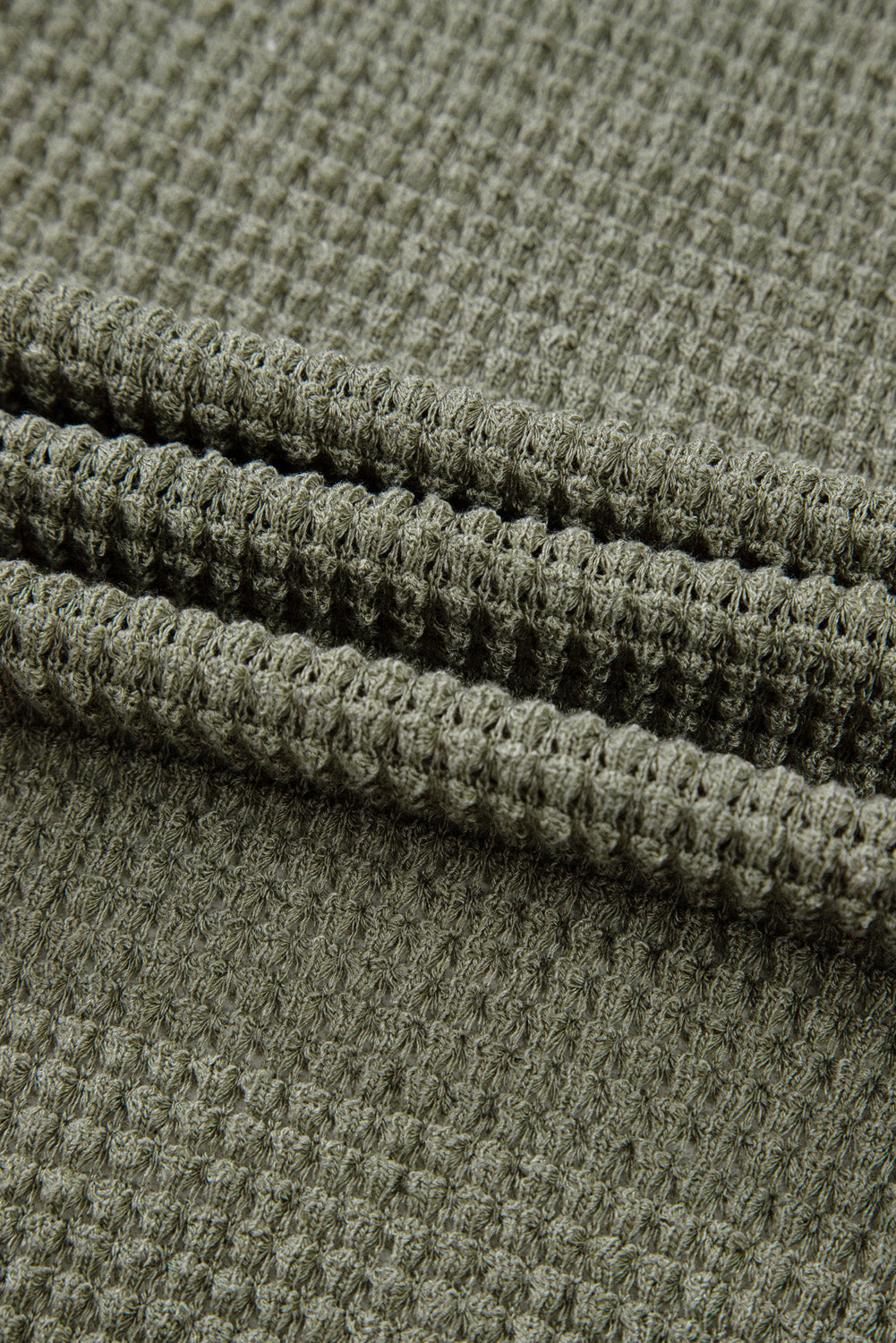 Cardigan grande taille en tricot gaufré a épaules tombantes ouvert sur le devant avec poche