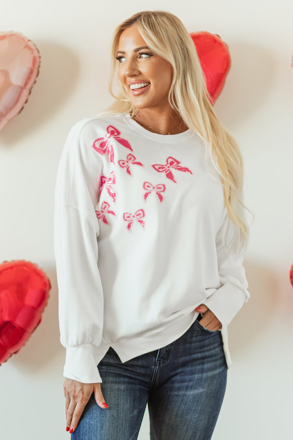Sweat-shirt surdimensionné a paillettes et nœud papillon