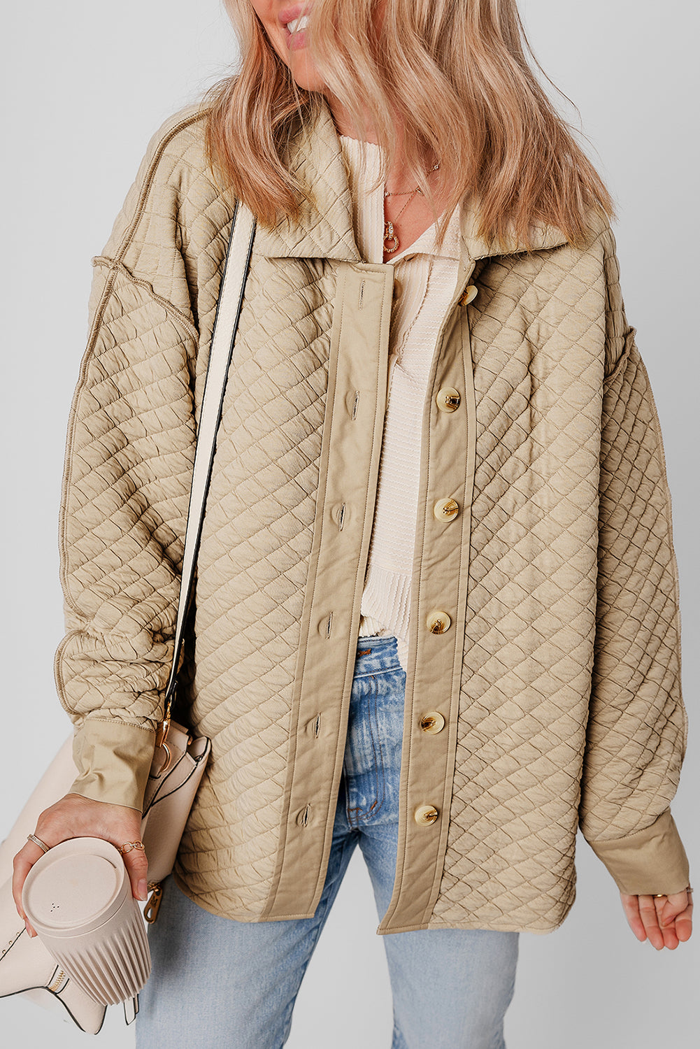 Veste matelassée boutonnée de couleur unie