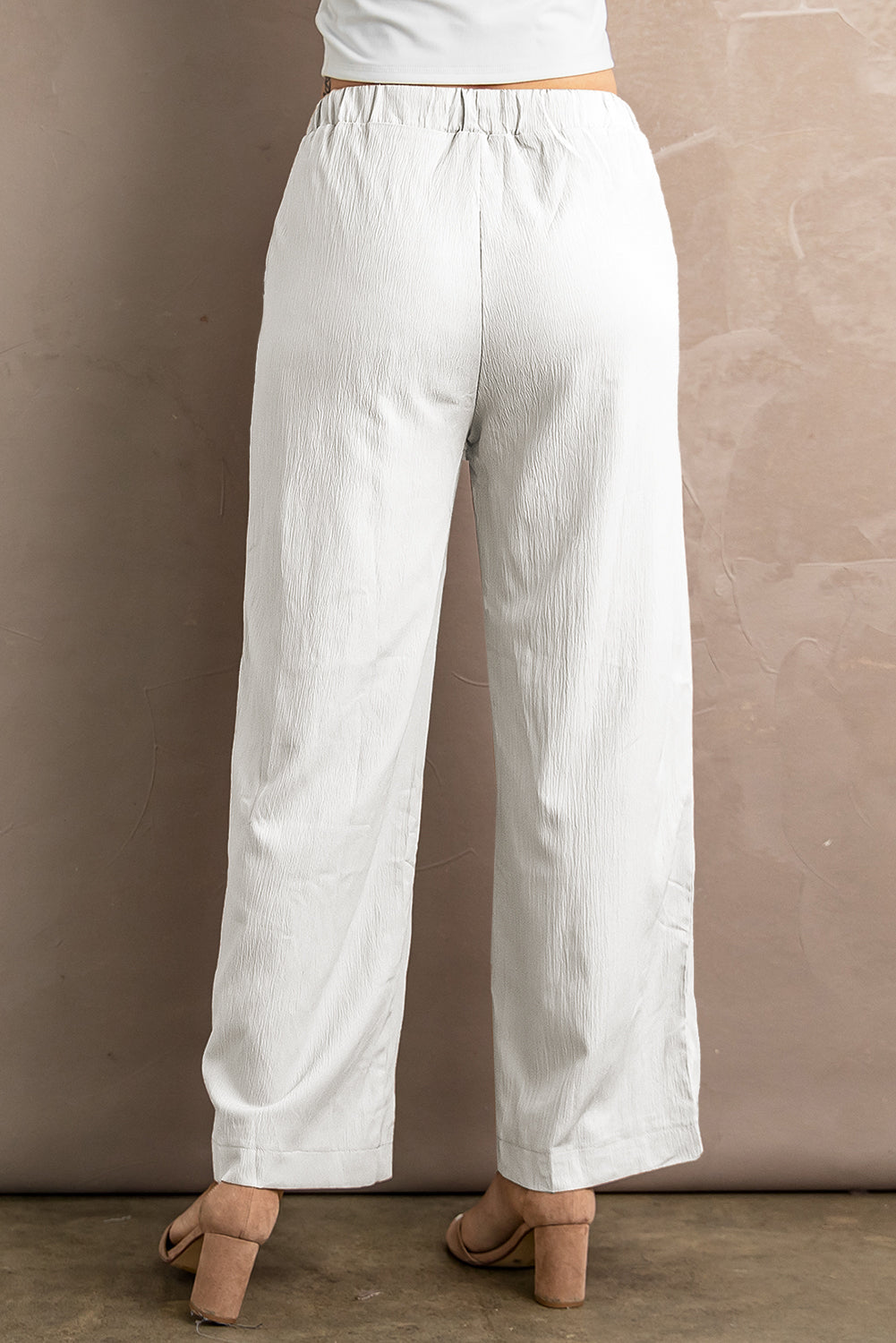 Pantalon large froissé blanc à taille avec cordon de serrage