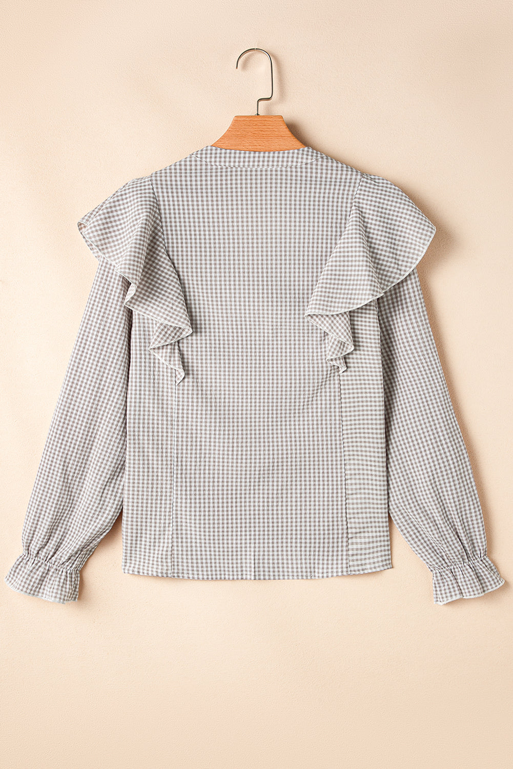 Chemise à volants à carreaux et manches à volants