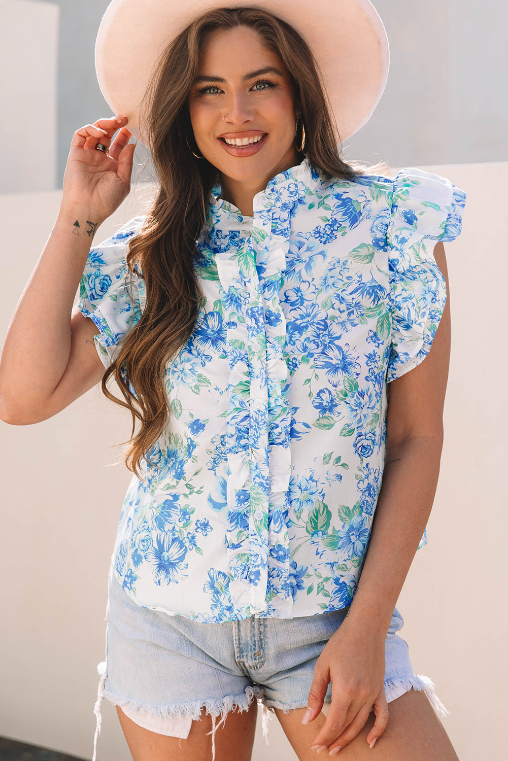 Chemise boutonnée à volants et manches à imprimé floral