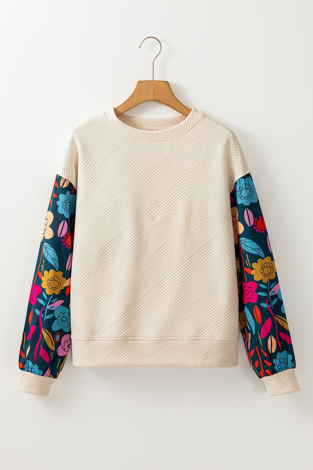 Haut en tricot texturé a épaules tombantes et manches florales contrastées