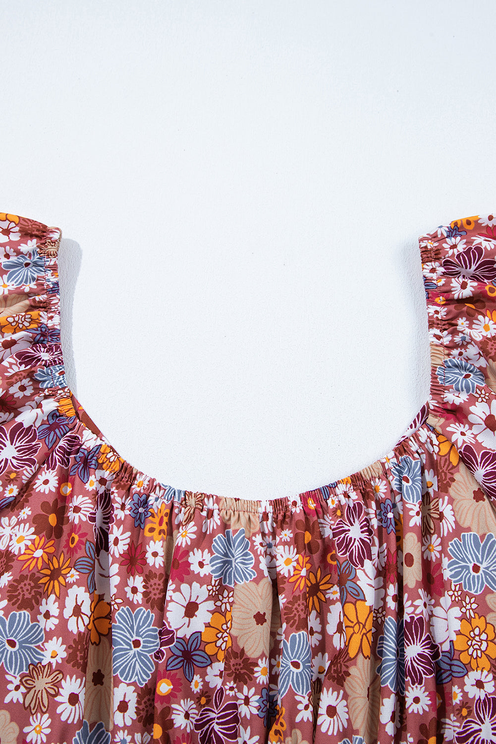 Mini-robe fleurie à manches bouffantes, col carré, nœud et dos ouvert