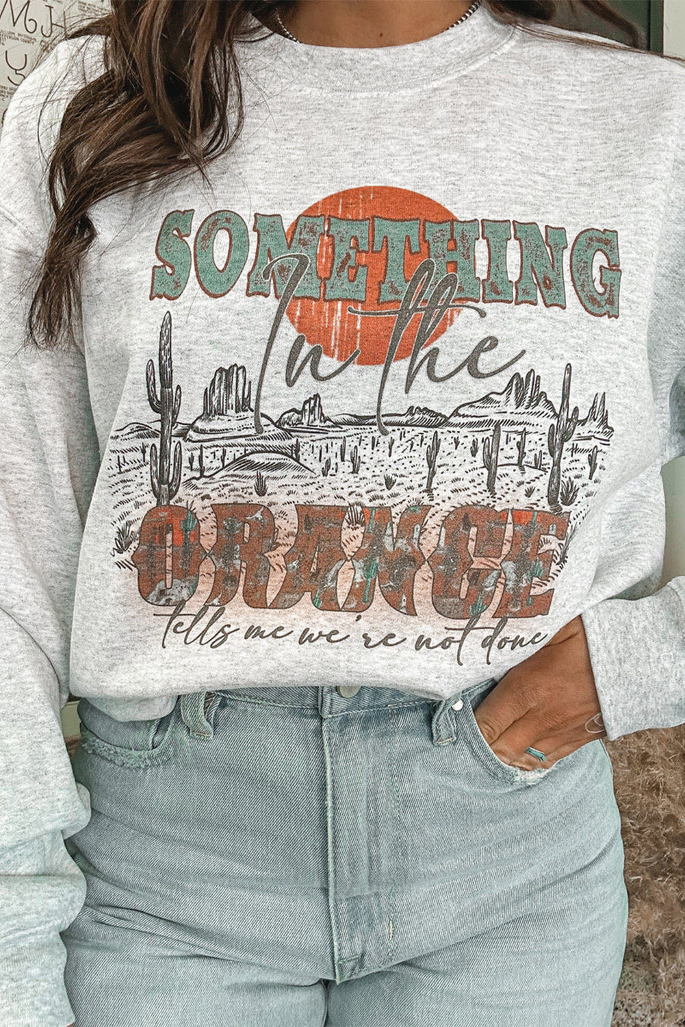 SOMETHING ORANGE Sweat-shirt décontracté graphique