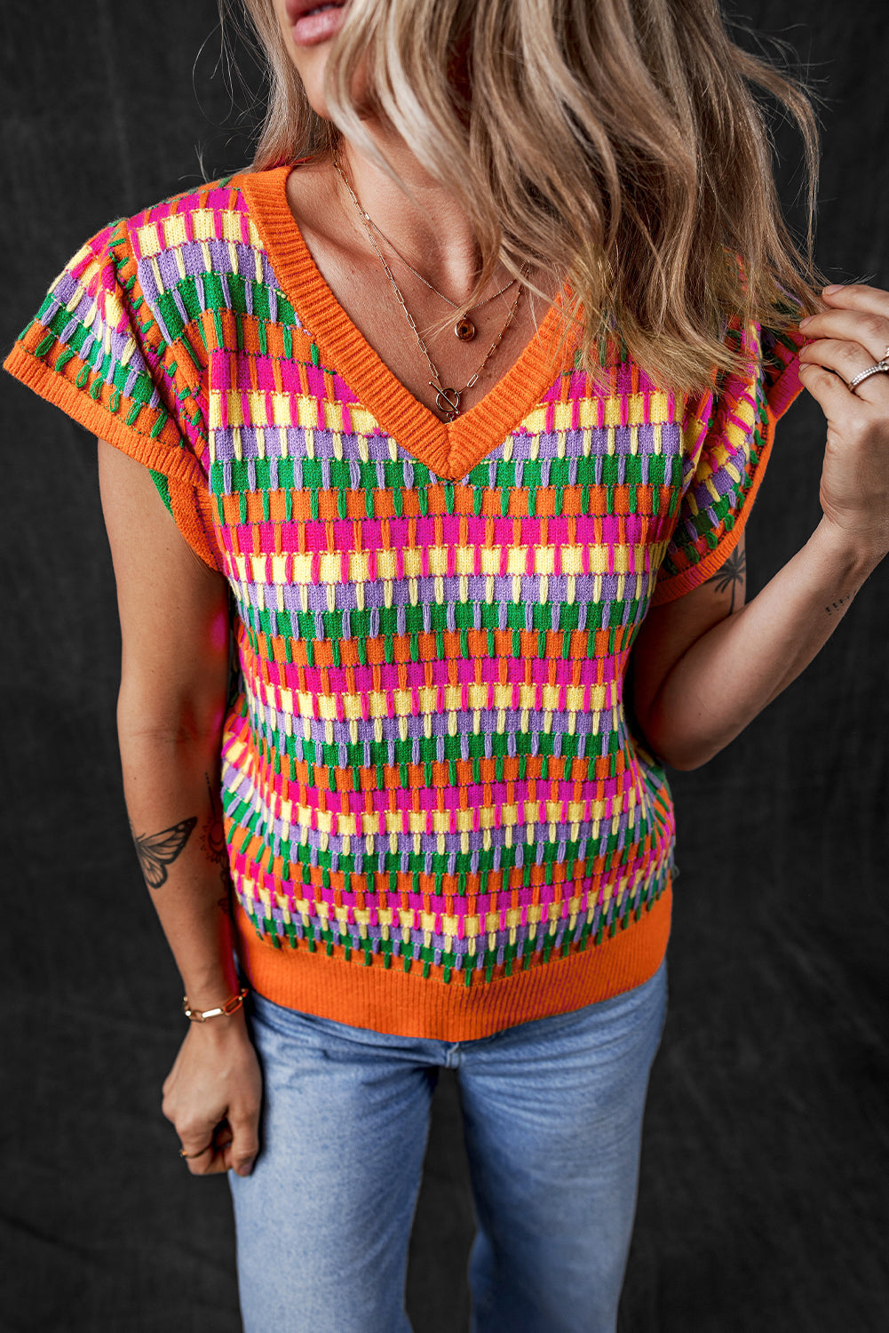 Haut pull tricoté a manches flottantes multiples