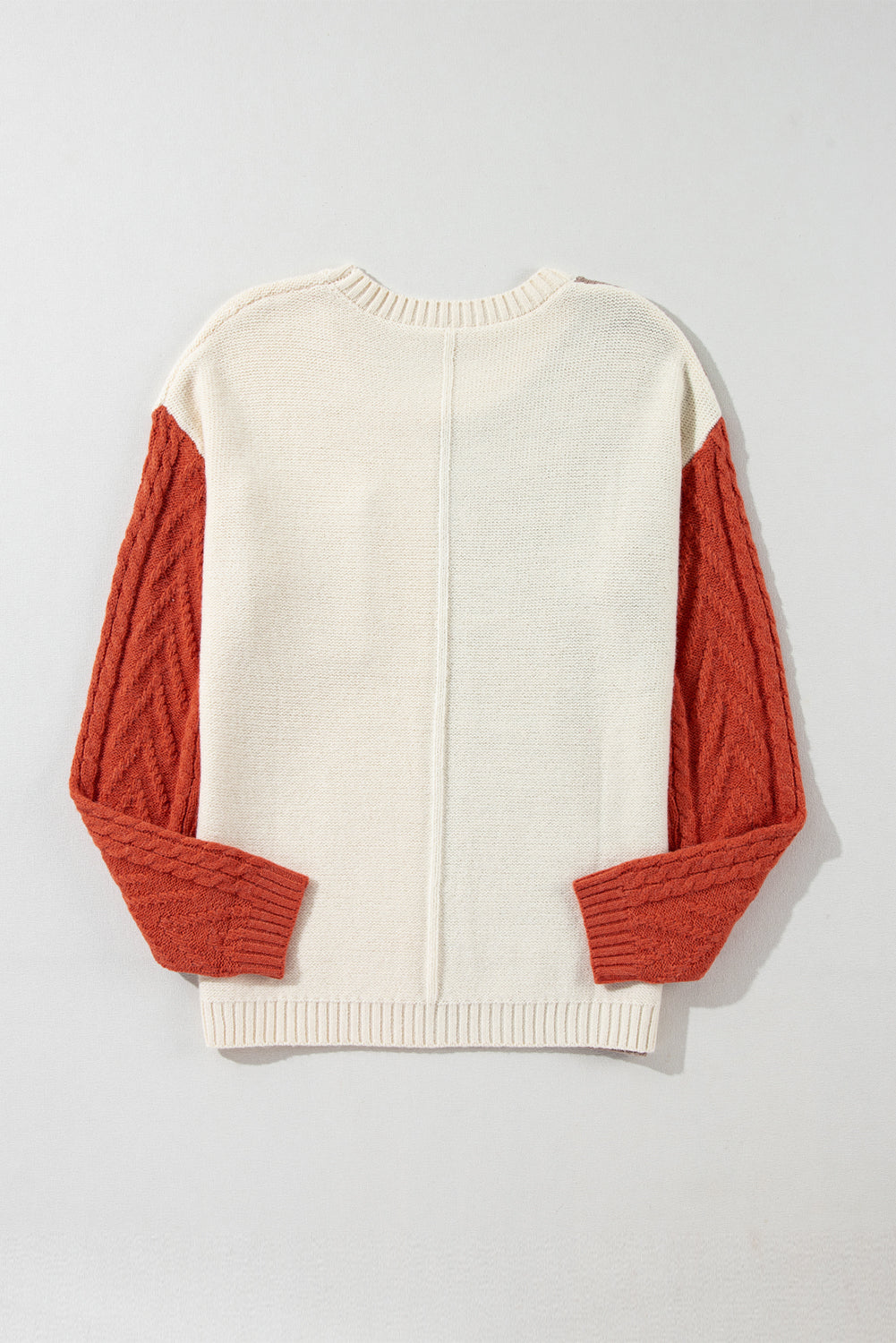 Pull a épaules tombantes et poche plaquée color block
