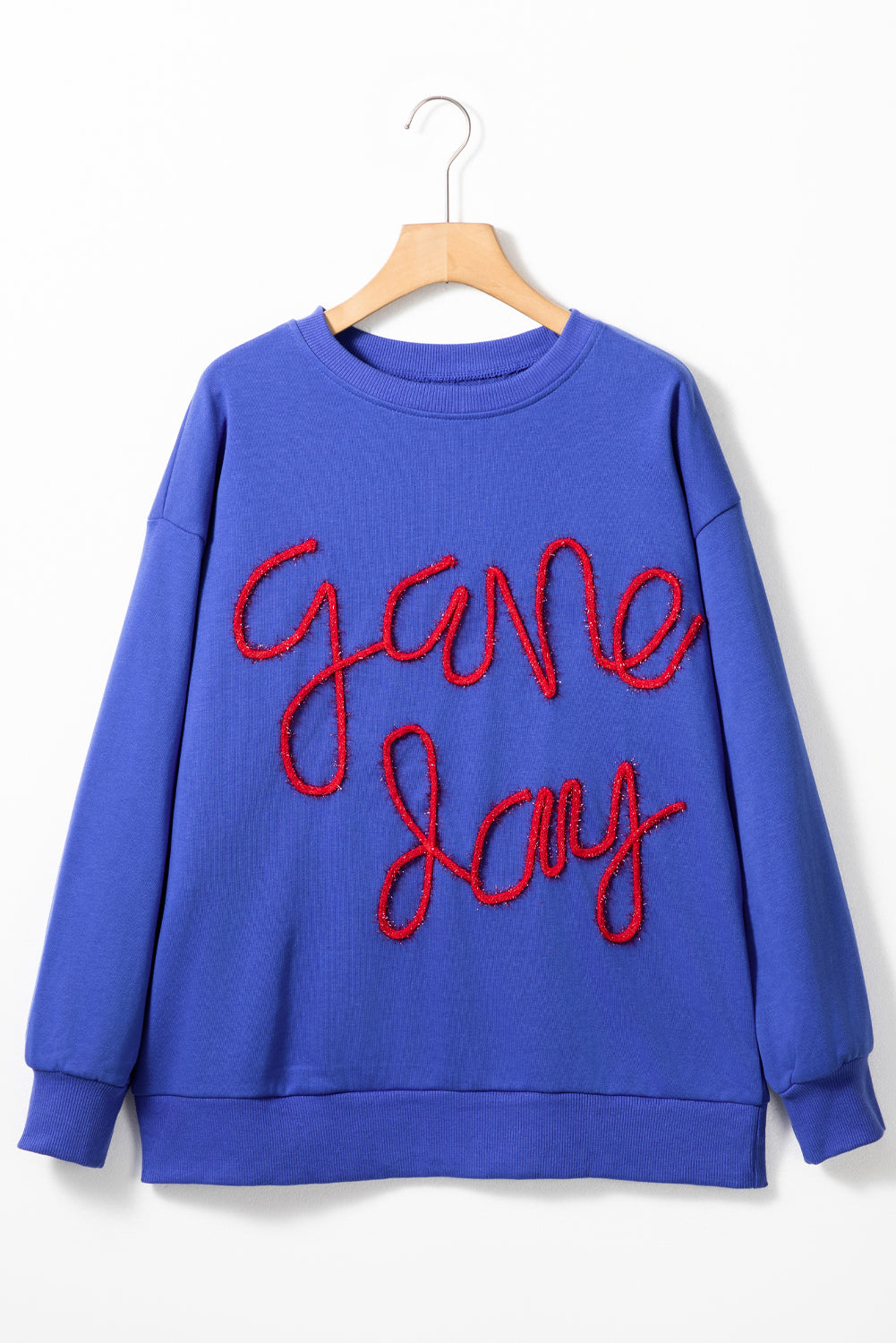 Tinsel Game Day - Sweat-shirt graphique a épaules tombantes