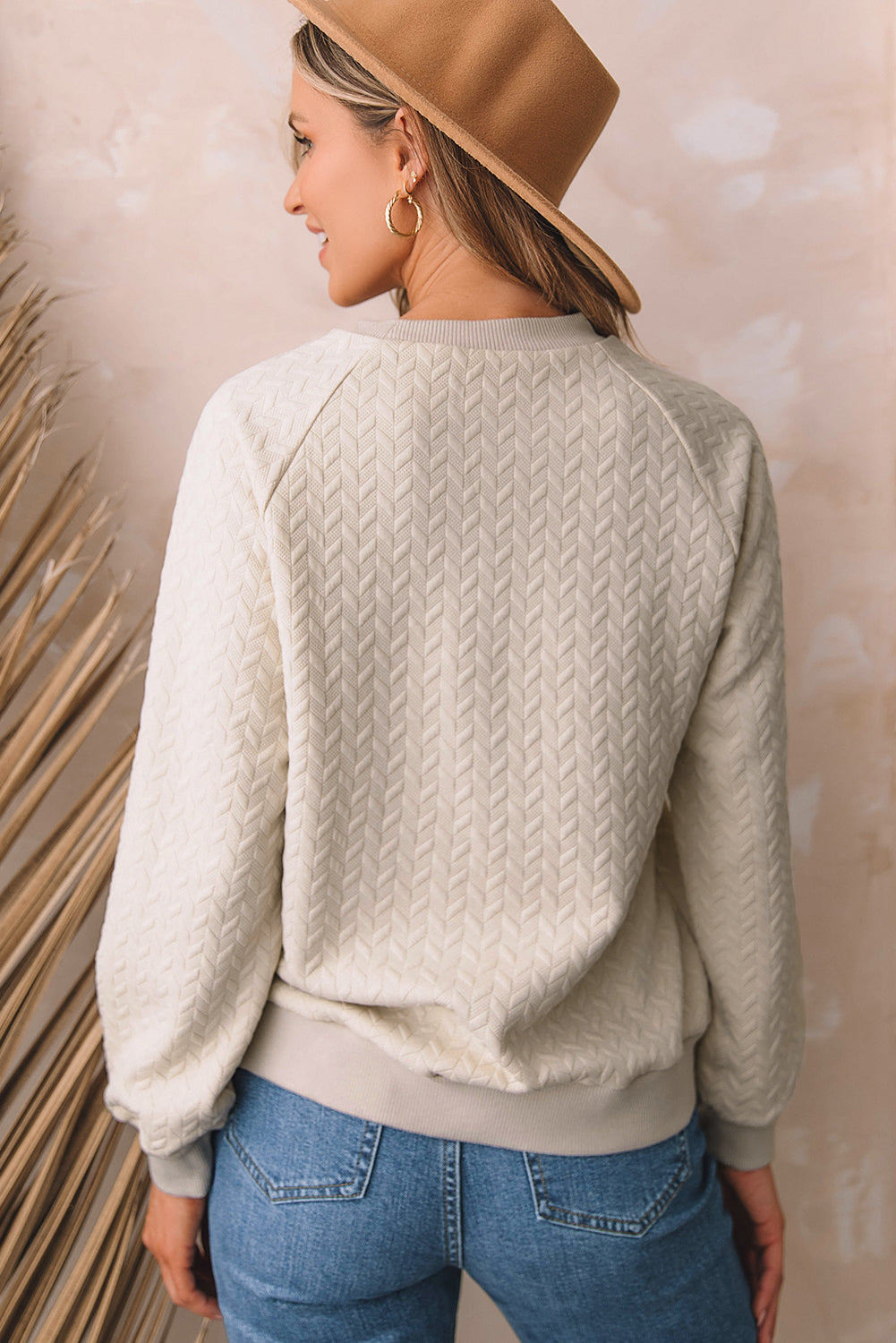 Sweat-shirt à manches raglan texturé uni