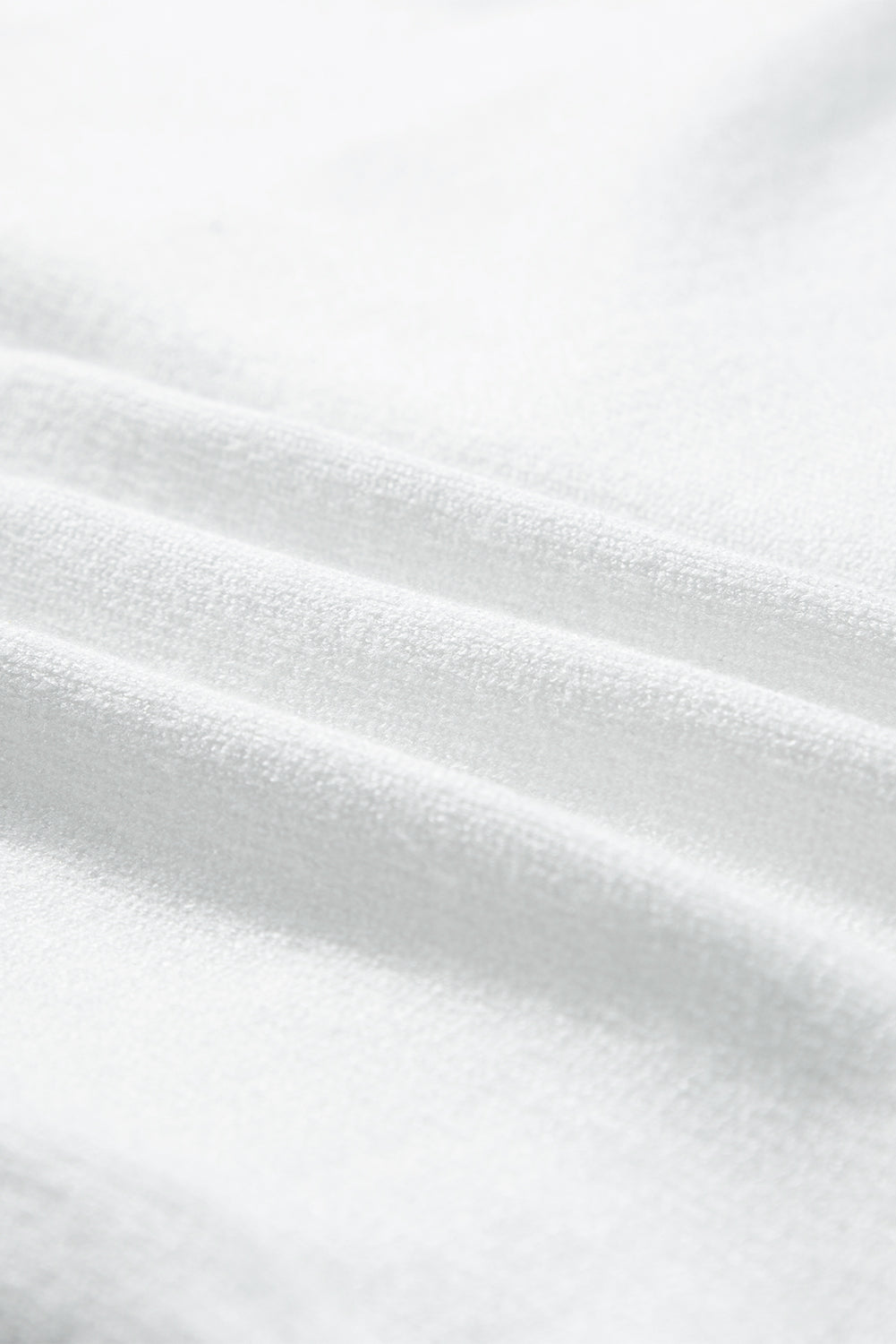 T-shirt pull texturé a boutons dorés