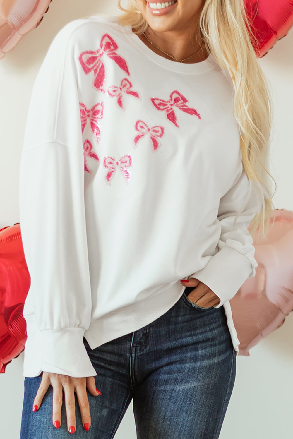 Sweat-shirt surdimensionné a paillettes et nœud papillon