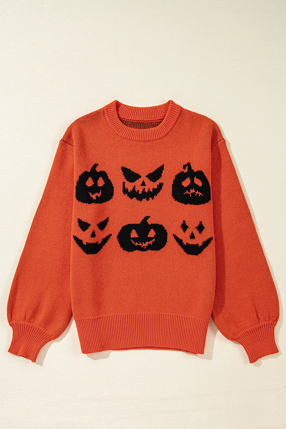 Pull a épaules tombantes a motif de visage de citrouille d'Halloween