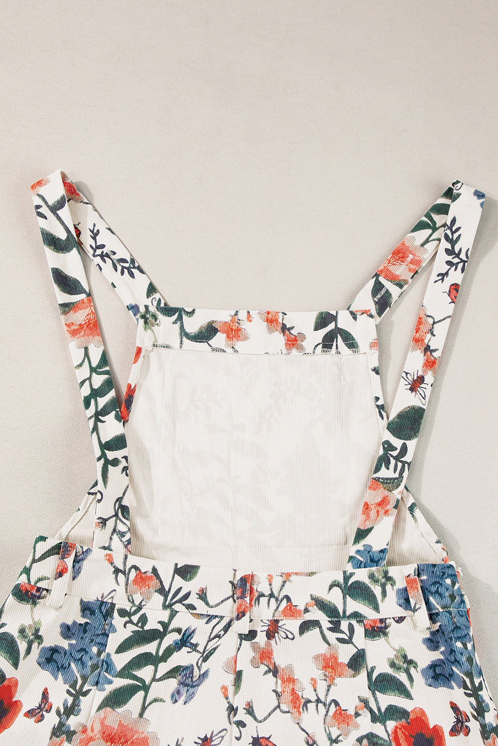 Barboteuse à dos nu et imprimé floral