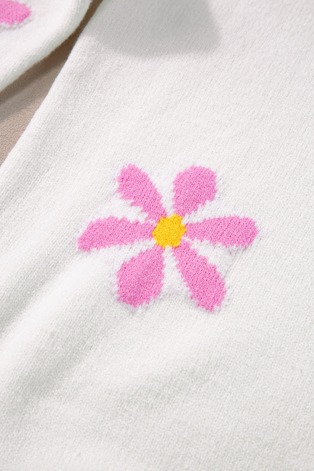 Pull élégant à bord côtelé à motif floral
